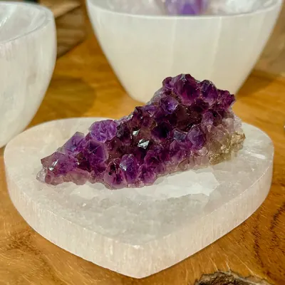 Amethyst cluster crystal on selenite heart charging pad